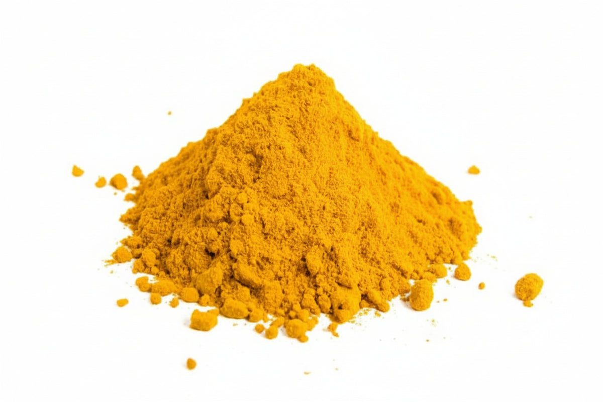 Premium Curry Powder Mild - golden yellow powder on a clean white background showing fine texture
